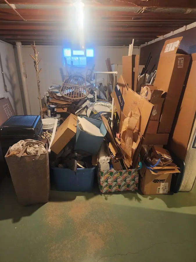 Roll-off dumpster container at job site for 2 Yard Dumpster Rental in Clover